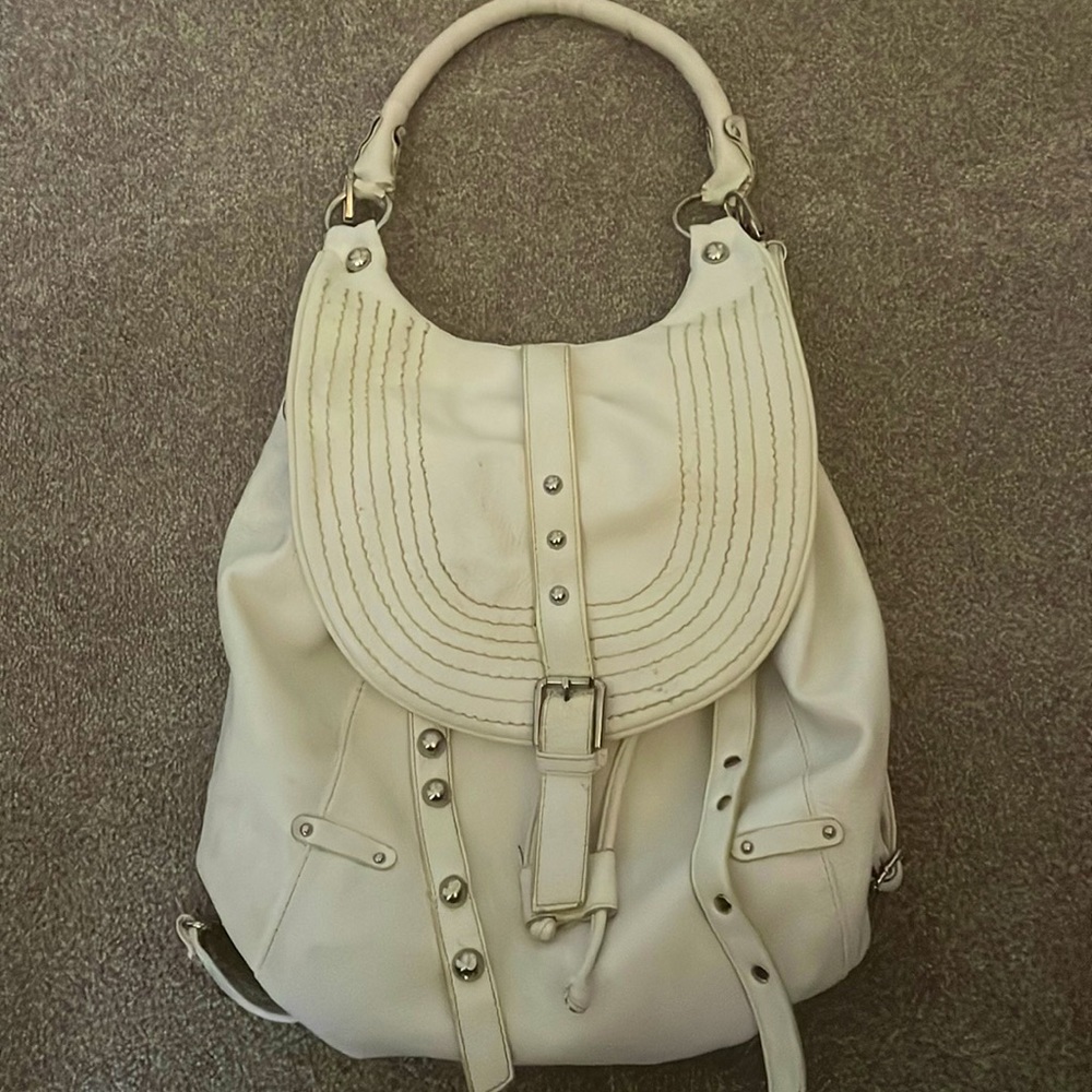White leather backpack/purse.